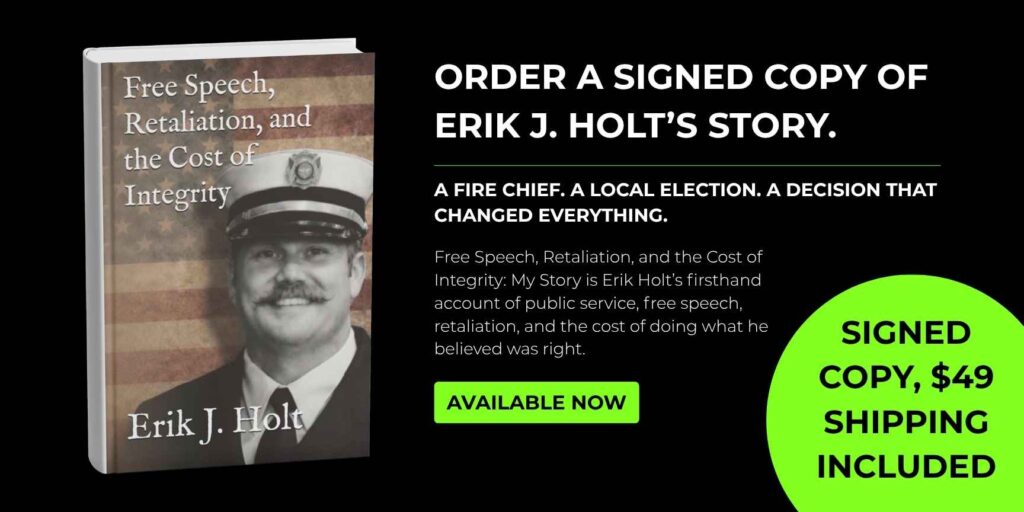 Home page banner promoting a signed copy of Erik J. Holt’s book, Free Speech, Retaliation, and the Cost of Integrity: My Story, available for $49 with shipping included.